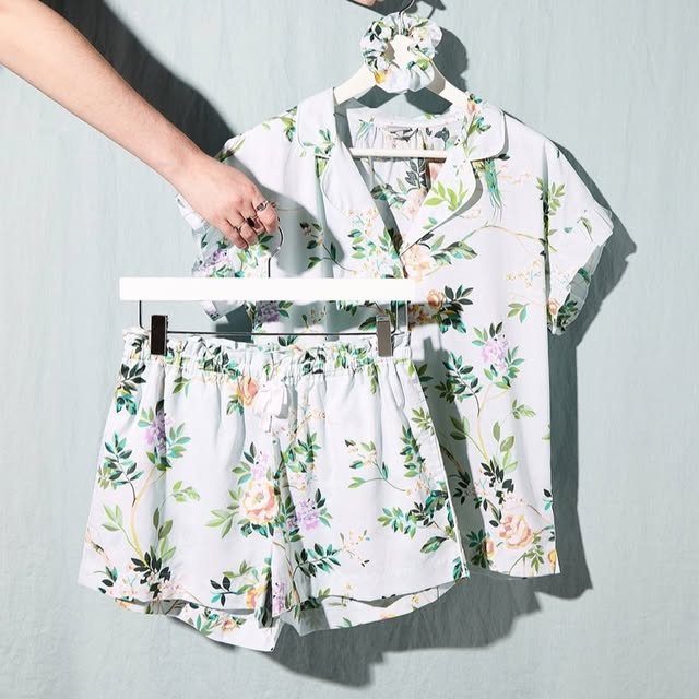 White floral short set on hangers with matching scrunchie